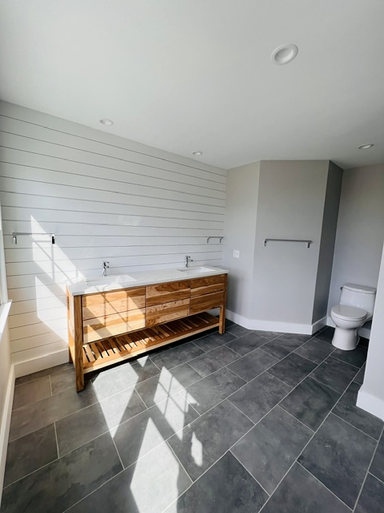 Bath with custom wood vanity