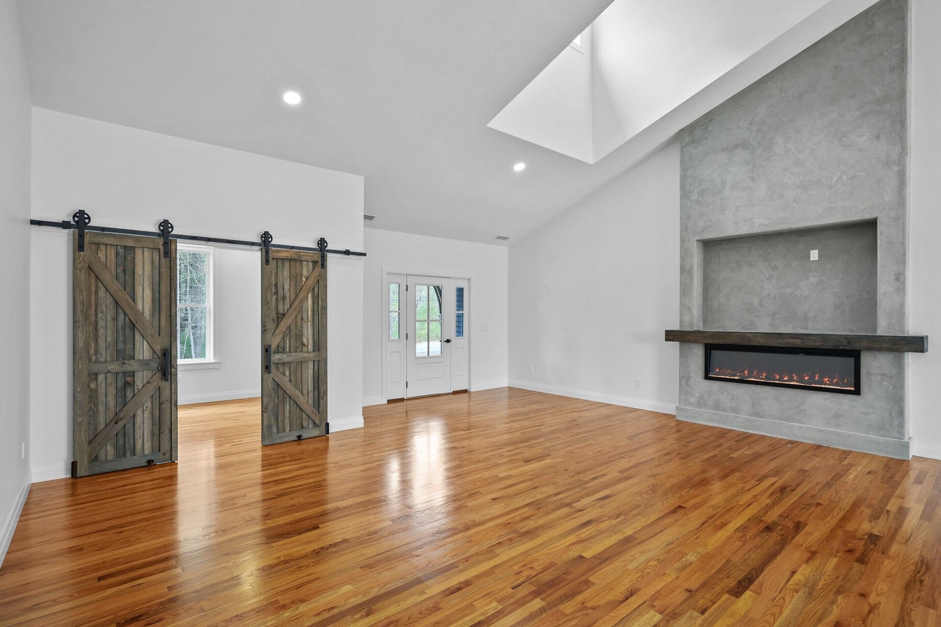 Open living with fireplace